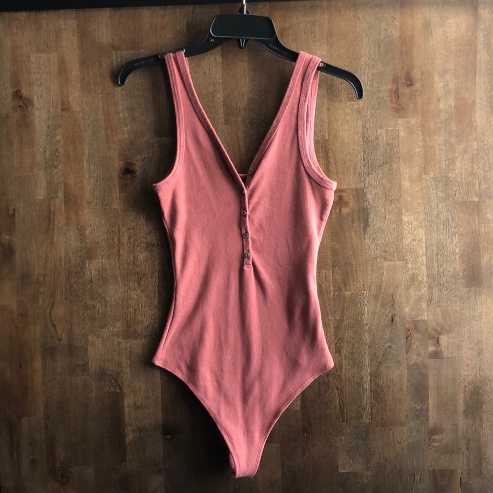 Pink bodysuit